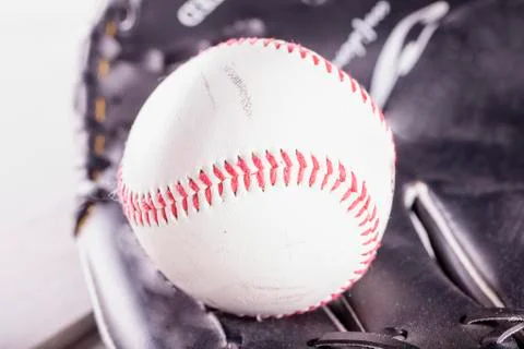 Baseball in glove Stock Photos