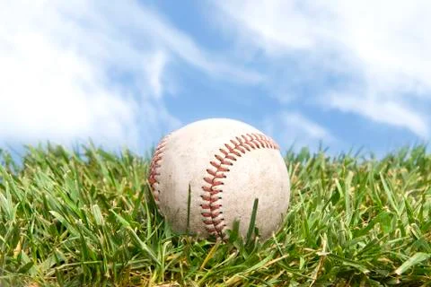 Baseball on grass Stock Photos