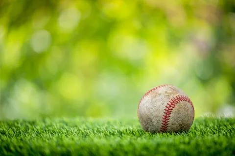 Baseball on grass Stock Photos