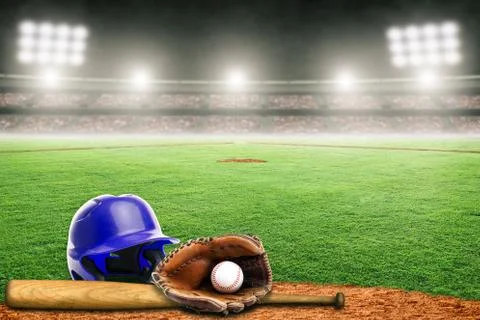 Baseball Helmet, Bat, Glove and Ball on Field in Outdoor Stadium With Copy Sp Stock Photos