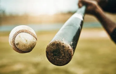 Baseball hit, sports and athlete on a outdoor field hitting a ball in a game Stock Photos