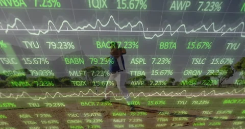 Baseball pitcher lifting glove and rotating arm while tickers shifting chart Stock Footage 314687525