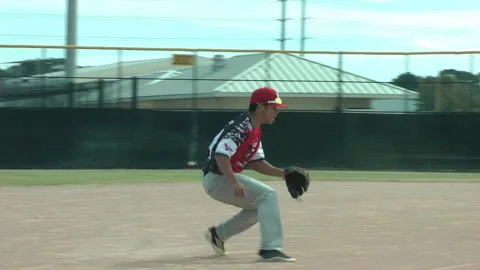 Baseball player catch and throw ball Stock Footage 159560202