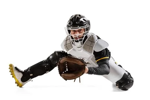 Baseball player, catcher in action in white sports uniform and equipment Stock Photos