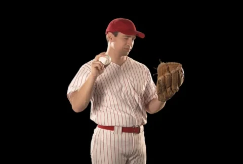 Baseball Player Close Up with Ball &amp; Glove Stock Footage 754203