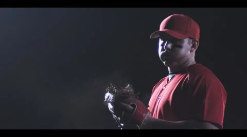 Baseball player pitcher eyes first base, throws pitch, SLOW MOTION Stock Footage 49623694