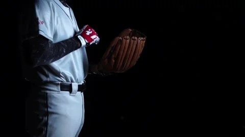 A baseball player pitcher with his baseball and baseball gloves Stockbeeldmateriaal 227732711