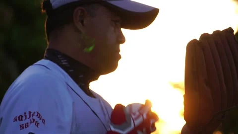 A baseball player pitcher with his baseball and baseball gloves Vídeos de archivo 227733023