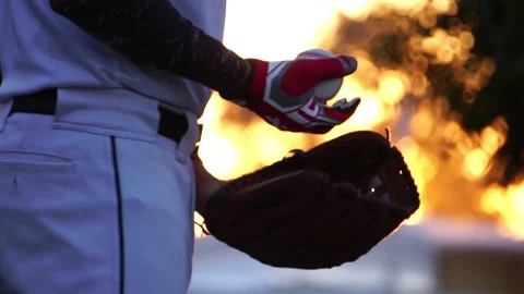 A baseball player pitcher with his baseball and baseball gloves Stock Footage 227733232