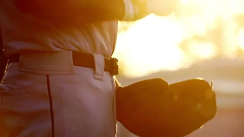 A baseball player pitcher with his baseball and baseball gloves Stock Footage 228064546