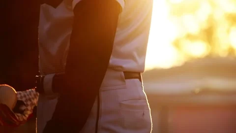 A baseball player pitcher with his baseball and baseball gloves Video stock 228064547