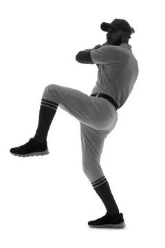 Baseball player pitching silhouette athletic performance and sports training  Stock Photos