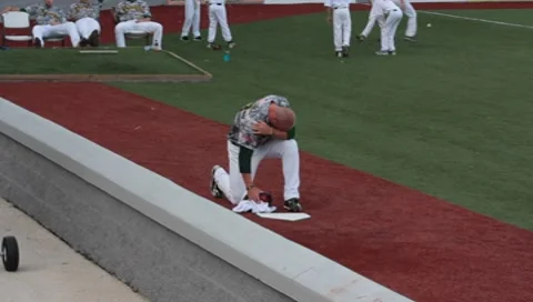 Baseball Player Praying on Field (HD) Stock Footage 7732823