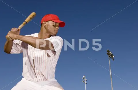 Baseball Player Preparing To Hit A Ball Stock Photos