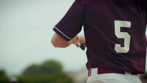 Baseball player runs after hitting a pitch Stock Footage 335869713