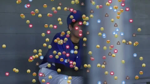 Baseball player shifting as reaction emojis drifting in and dissolving barrier Stock Footage 325966179