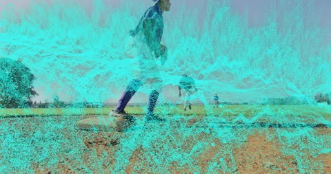 Baseball player sliding into base while fielder reaching for tag, with Stock Footage 307442658