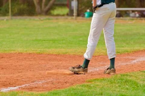 Baseball player on the third base Stock Photos