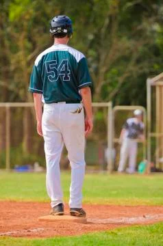 Baseball player on the third base Stock Photos