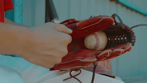 Baseball player warming up by throwing and catching ball with baseball glove 스톡 동영상 202149833