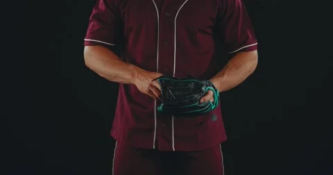 Baseball player warming up by throwing and catching ball with baseball mitt Stock-Footage 202150084