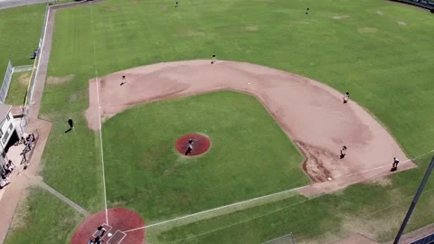 Baseball players playing a game on the field. Stock Footage 218440714