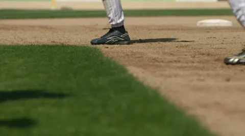 Baseball players run across field in slow motion Stock Footage 36064747