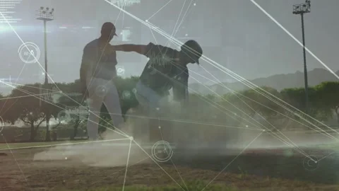 Baseball runner sliding into base, trying to reach, raising dust, fielder Stock Footage 333485643