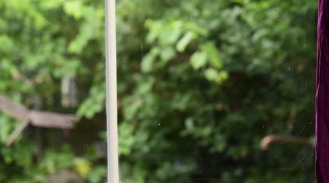 Baseball shatters a window Stock Footage 58603968