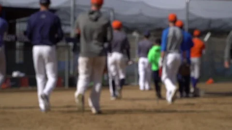 Baseball team leaving field - slow motion 動画素材 77369716