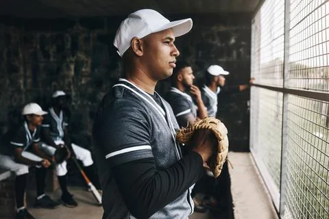 Baseball, training and coach in dugout, thinking and serious ,planning and Stock Photos