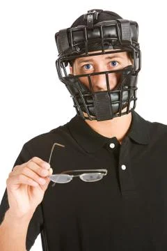 Baseball: umpire needs glasses to make call Stock Photos