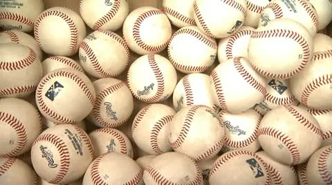 Baseballs Close Up Thrown In Box Stock Footage 22040713