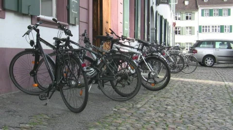 Basel bikes on cobblestone street Vidéo 701693