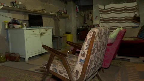 The basement of a building where Ukrainians are hiding from Russian shelling Stock Footage 245232152