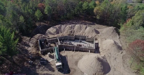 Basement Construction Concrete Forms in Woods Fall Autumn Aerial Drone Footage Stock Footage 81754215
