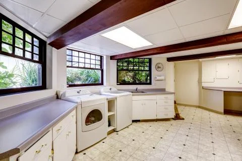 Basement with laundry area Stock Photos