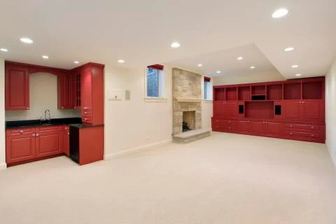 Basement with red wood cabinetry Stock Photos