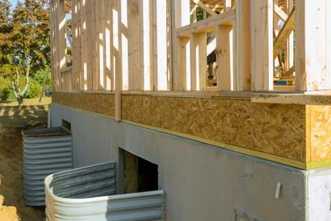 Basement renovation of installing window well basement Stock Photos