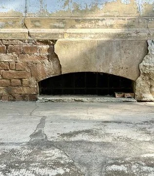 Basement ventilation with weathered brick Stock Photos