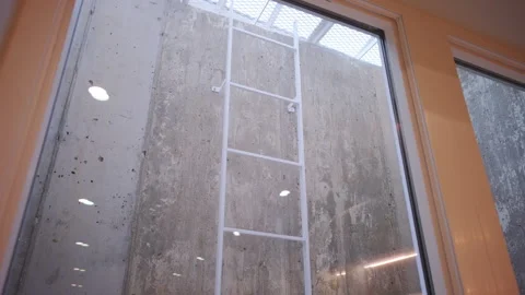 Basement windows of new house. move shot footage Vidéo 295970205