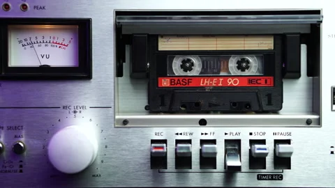 BASF Audio Cassette Tape Rolling in Vintage Deck Player, Close Up Stock Footage 234169185