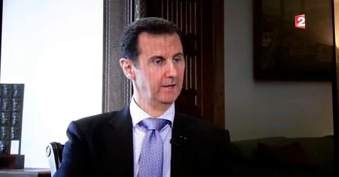 Bashar al-Assad, France 2, David Pujadas interview tv time-lapse fast motion Stock Footage 79777511
