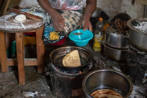 Basic African kitchen. Cooking on the fire Chapati - local food Stock Photos