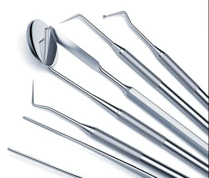 Basic dentist tools isolated on white Stock Photos