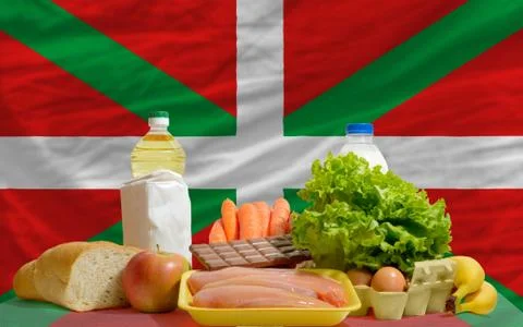 Basic food groceries in front of basque national flag Stock Photos