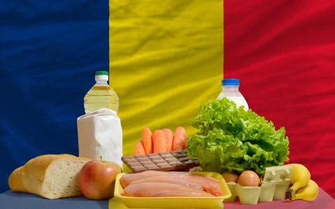 Basic food groceries in front of chad national flag Foto stock