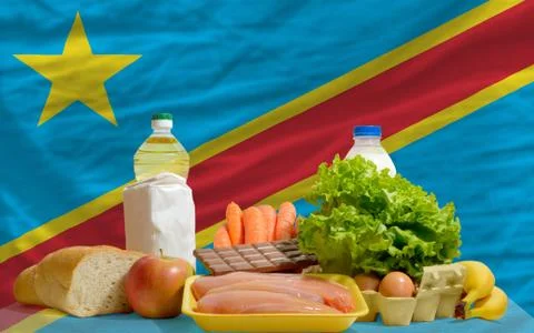 Basic food groceries in front of congo national flag 写真素材
