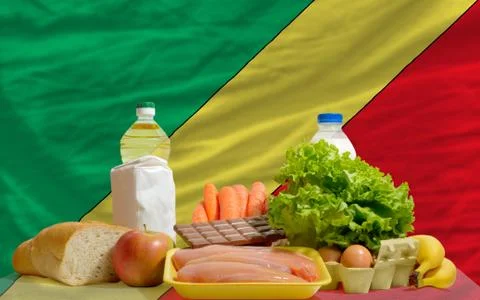 Basic food groceries in front of congo national flag 写真素材