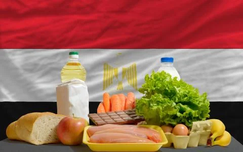Basic food groceries in front of egypt national flag 写真素材